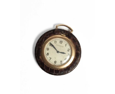 A Jaeger-LeCoultre open-faced pocket watch the dial with Arabic numerals in an unhallmarked yellow metal case with leather ou