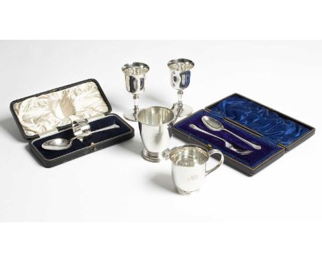A pair of small silver goblets feature marks for C J Vander Ltd., London 1973, 10.5cm high, two christening mugs, cased Chris