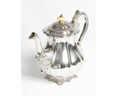 A George IV Irish silver teapot, Stephen Bergin, Dublin 1825, with ivory heat absorber and finial, 21cm high, approximately 1