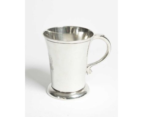 An Edwardian silver pint mug, SW Smith &amp; Co., London 1906, with scroll handle, initialled dated 1908, retailed by Warings