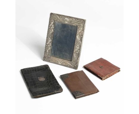 An Art Nouveau silver photograph frame Birmingham 1904, the frame decorated with stylised irises, to take a photograph 13cm x