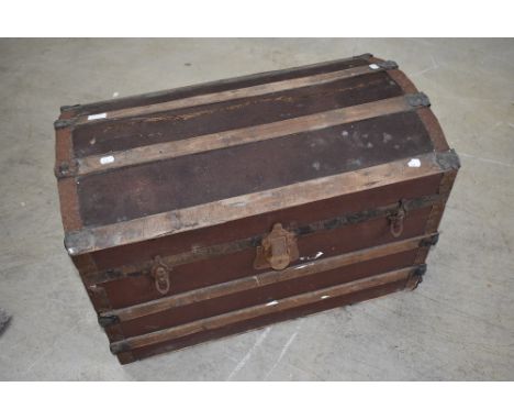 A vintage dome top travel trunk, width approx. 77cm