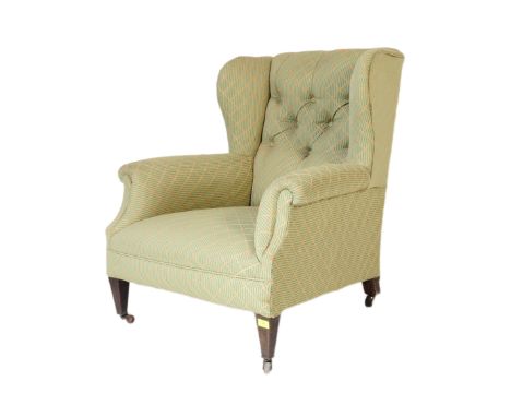 A 19th century Victorian wing back&nbsp; fireside lounge armchair. Having a straight top rectangular back rest with button ba