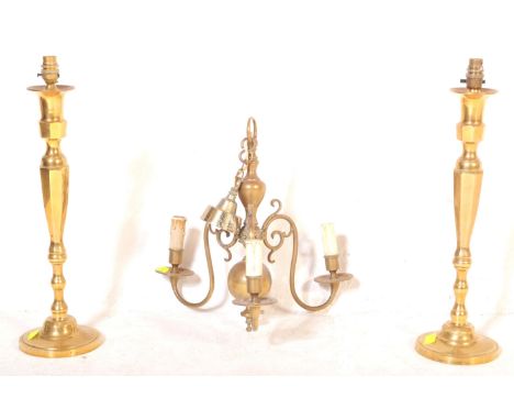 A Victorian 19th century brass hanging ceiling light. With central pediment with three curved arm branches into converted lam