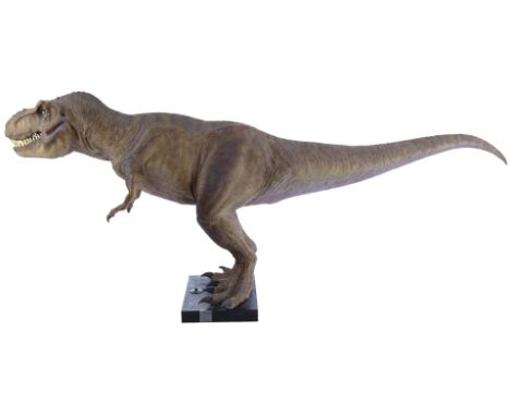 JURASSIC PARK - 1:5 Scale Tyrannosaurus-Rex Maquette ReplicaA 1:5 scale Tyrannosaurus-Rex maquette replica cast from an origi