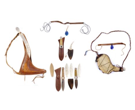 LAST AIRBENDER, THE - Katara's (Nicola Peltz) Necklaces and Water Skin and Sokka's (Jackson Rathbone) Boomerang and DaggersKa