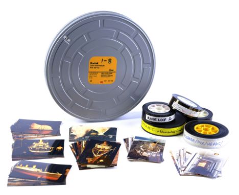 TITANIC - Tin of 35mm Film Reels with Box of Continuity and Set PhotosA tin of 35mm film reels with a box of continuity and s