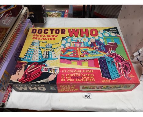 A boxed Chad Valley Doctor Who give a show projector &amp; slides