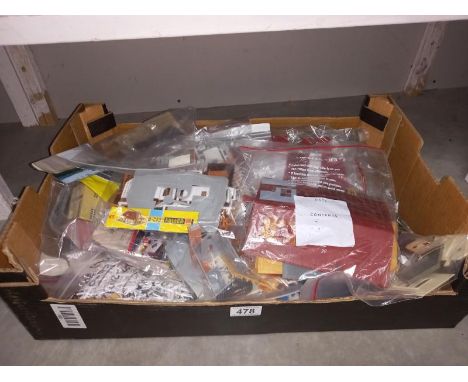 A large quantity of plastic model kits, mainly model railway layout buildings, no boxes, no instructions, unchecked.