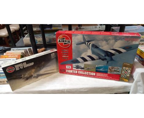 A boxed airfix A50065, 05020, Spitfire and Douglas AC- 47, gunship. Both used, Douglas sealed. scale 1:72