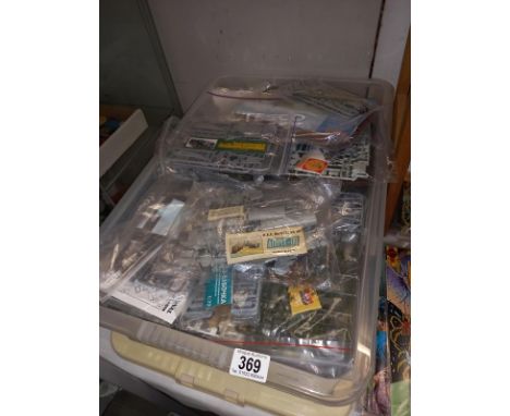 A large quantity of plastic model kits, mainly military vehicles. All unboxed, unchecked, no instructions