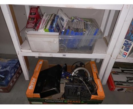 A quantity of PlayStation, Xbox, Nintendo, Wii games and hand controls and Xbox 360 console