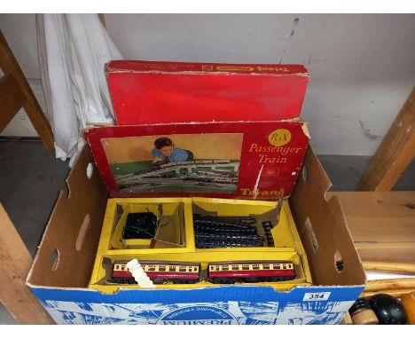 A Triang R.161 operating hopper car set. Incomplete and a Triang R1X passenger train set, both A/F