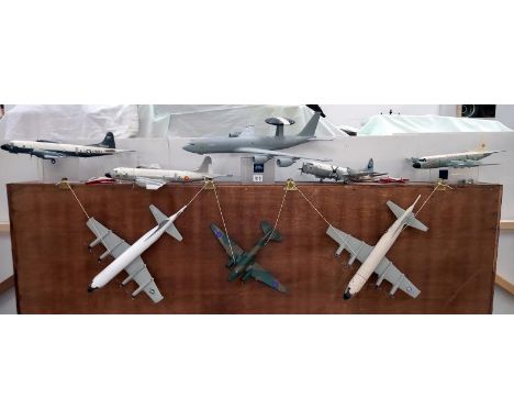 A selection of assembled plastic model aircraft from kits