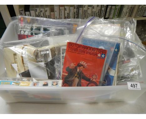 A quantity of plastic figure model kits including Tamiya motor racing team. No boxes or instructions, unchecked