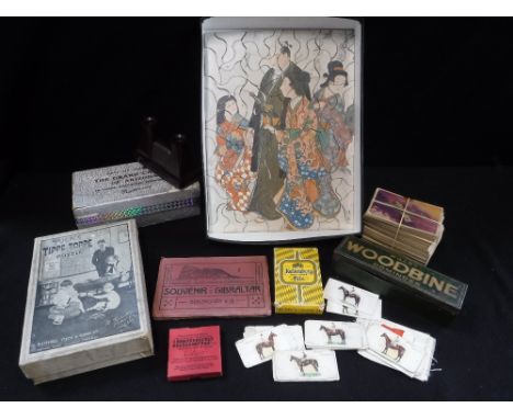 A QUANTITY OF ASSORTED VINTAGE PLAYING CARDS, postcards and other items