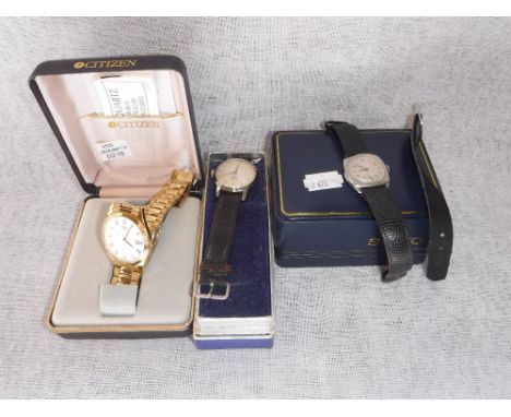 A VINTAGE CHROME CASED ROTARY WRISTWATCH, a modern Citizen quartz wrist watch and a vintage Shield white metal cased wristwat