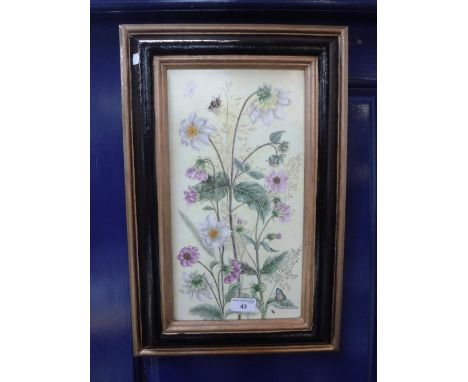 A PAINTED CERAMIC PANEL, decorated with flowers, a butterfly and a bee in painted wood frame