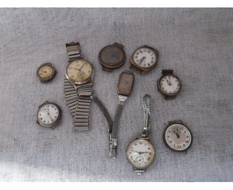 A COLLECTION OF SILVER AND WHITE METAL CASED WRISTWATCHES including an Art Deco Cartier style guilloche enamel dial example 