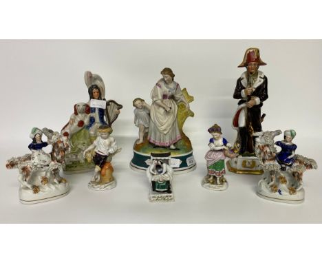 A collection of Staffordshire pottery flat back figures, Chelsea porcelain figures along with soldier figure [30cm] 