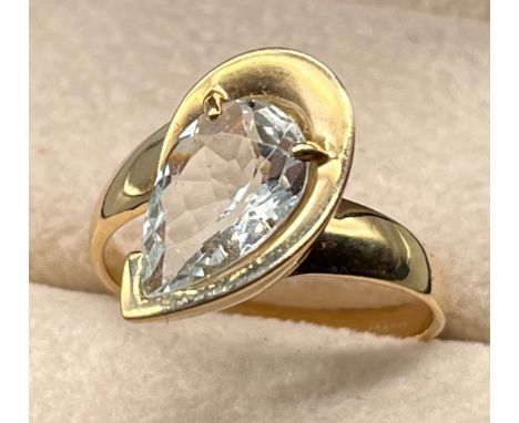 9ct yellow gold ring set with a pear cut gem stone. [Ring size R] [4.99Grams] 