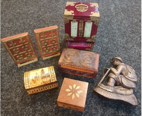 Oriental collectable odds, decorative carved boxes, brass bookends, brass inlaid trinket box and wall plaque. 