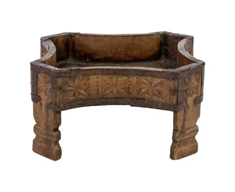 An Indian carved wood planter / rice stand, early 20th century. Height 17.5cm, width 32.5cm, depth 32.5cm.