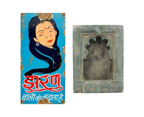 An Indian green hardstone niche. Height 20.5cm, width 15.5cm, depth 7.5cm and a Jharan hair oil enamel metal advertising sign