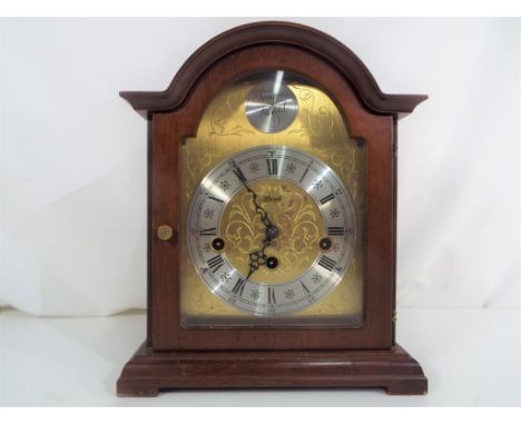 A mantel clock, Roman numerals, silvered chaptering with outer second track, movement marked Franz Hermle Made in Germany  Th