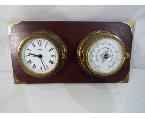 A nautical styled brass clock and barometer compendia by Rotary presented on a mahogany wall mount with protective brass corn