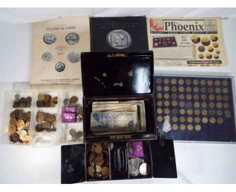 A lot to include a quantity of coin collecting ephemera, a tray containing in excess of 60 threepence pieces, a vintage cash 