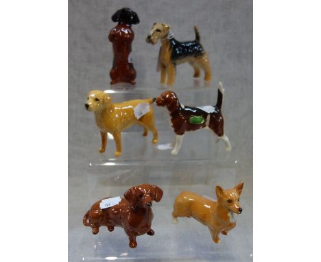 BESWICK; A COLLECTION OF DOGS, to include, a Corgi, a Terrier and others (6)