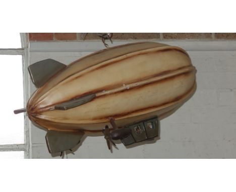 A PAINTED COMPOSITION HANGING MODEL AIR SHIP