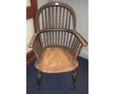 AN EARLY 19TH CENTURY STICK-BACK WINDSOR ARMCHAIR with traces of original paintwork