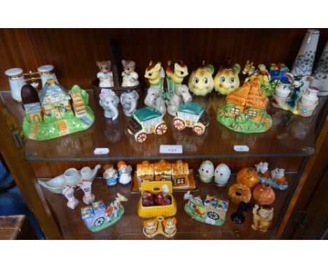 A COLLECTION OF JAPANESE AND OTHER NOVELTY CRUET SETS, including a monkey using a candlestick phone