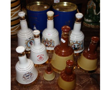 A COLLECTION OF BELL'S SCOTCH WHISKY commemorative bottles by Wade, mostly with contents
