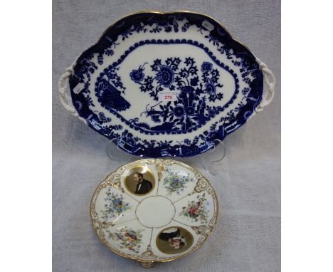 A VICTORIAN BLUE AND WHITE CERAMIC TRAY and a Victorian ceramic stand, with portraits of Victoria and Albert (2)