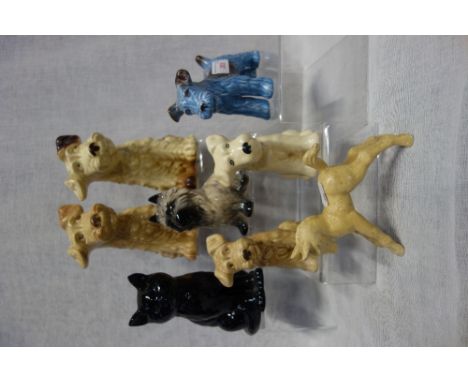 A COLLECTION OF SYLVAC DOGS and similar ceramic animals