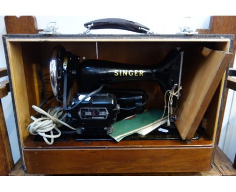A VINTAGE SINGER ELECTRIC SEWING MACHINE MODEL 99K EK613902
