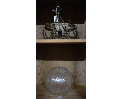 AN EDWARDIAN GILT BRASS HANGING LIGHT FITTING, swag decoration and a crackle glass globular lamp shade