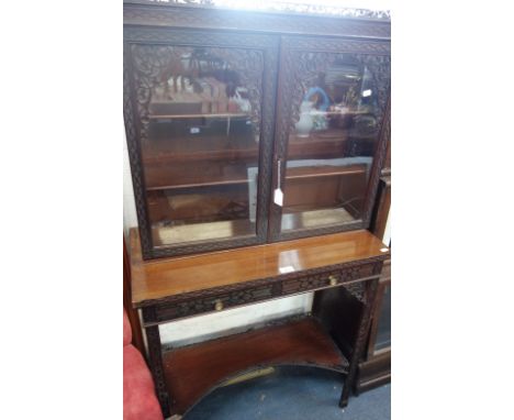 A VICTORIAN MAHOGANY CHIPPENDALE REVIVAL DISPLAY CABINET, with blind fretwork decoration, 73cm high x 128.5cm wide