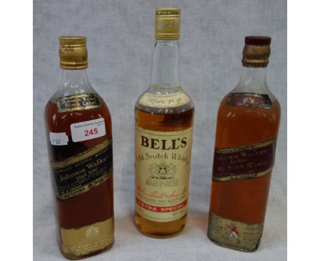 A BOTTLE OF JOHNNIE  WALKER BLACK LABEL WHISKY, 4/5 QUART, another similar Red Label and a bottle of Bell's Extra Special Old