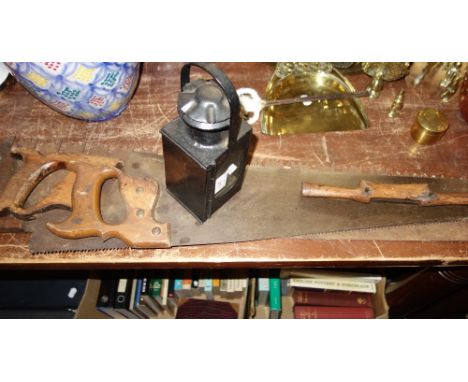 BRITISH RAILWAYS BLACK PAINTED METAL OIL LAMP, the burner stamped "BR/SR", three vintage carpentry saws and a spokeshave