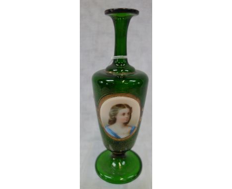 A BOHEMIAN GREEN GLASS VASE, with overlaid opaque oval with portrait and gilt decoration, 20cm high