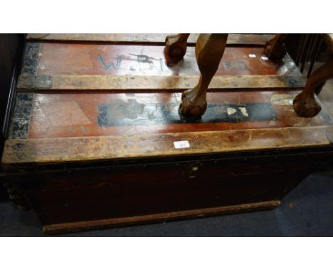 A VINTAGE METAL BOUND WOODEN CABIN TRUNK