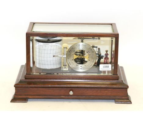 Lawrence &amp; Mayo (London) Barograph with eight vacuum sections, circular dial indicting current pressure and 'Stormy, Rain