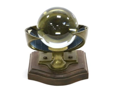 Sunshine Recorder brass housing on wooden base with approx. 3 3/4'' glass sphere