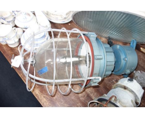 A LARGE VINTAGE INDUSTRIAL LAMP, with blue painted aluminum body and wire covered glass dome, 62 cm high