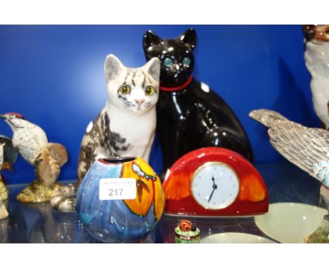 A WINSTANLEY CAT, ANOTHER CAT, a Poole Pottery clock, a Limoges ladybird pillbox and a Poole Pottery vase