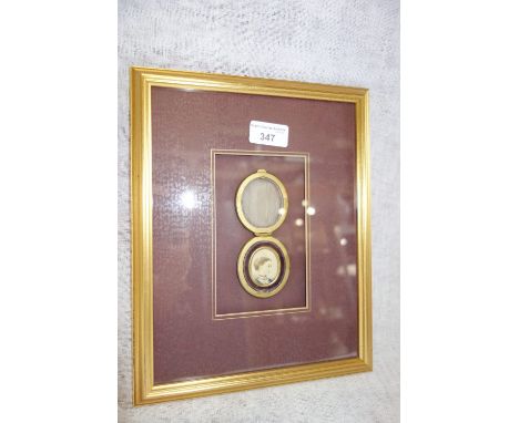 A MINIATURE PORTRAIT OF A LADY'S HEAD AND SHOULDERS, in a fitted flip top case, framed and behind class 